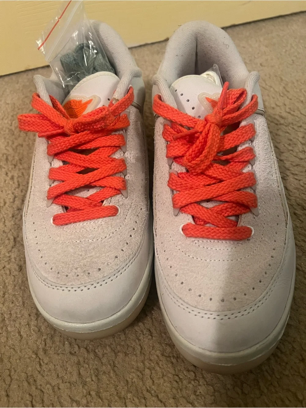 Nike White Sneakers with Bright Orange Accents